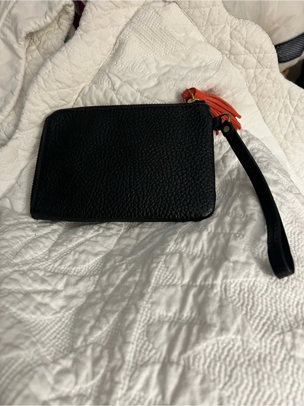 Fossil Black Leather Wristlet with Coral Tassel Accent